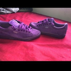 Purple suede pumas